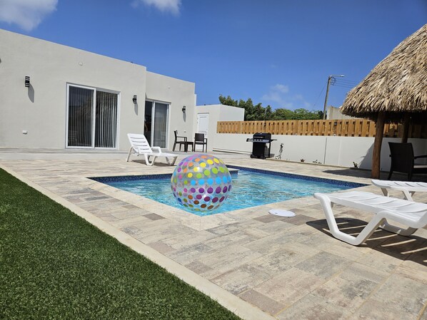 Pool with lounge chairs