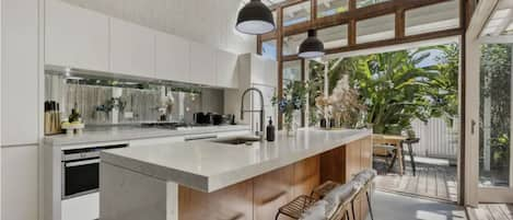 Beautiful light filled kitchen and outside deck
