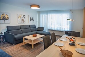 Living area with a sofa for 2 adults
