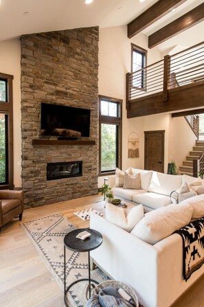 Spacious living room with soaring ceilings