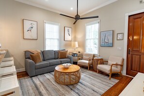 Living Room with Smart ROKU TVs, Hardwood Floors and Queen Sleeper Sofa
