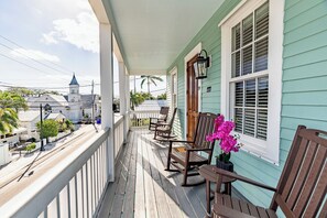 Second Floor Balcony with Partial Duval Street and Lighthouse Views
