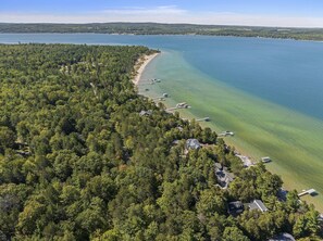 Lake Charlevoix South Shore Coast - The Harborage Condominium complex is located on the South shore of Lake Charlevoix with crystal clear water and sandy beache