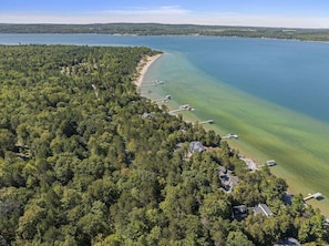 Lake Charlevoix South Shore Coast - The Harborage Condominium complex is located on the South shore of Lake Charlevoix with crystal clear water and sandy beache