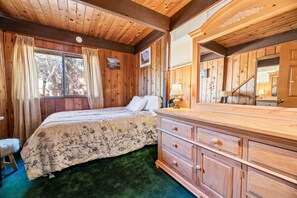 Downstairs bedroom with queen bed