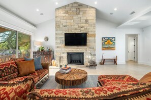 Leuder wood-burning fireplace great room with incredible views.
