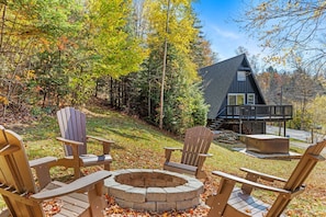 View of the fire pit with the house in the background.