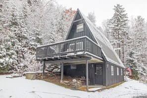 Front door view with second floor deck