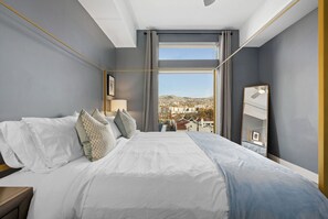 Relax in this highly designed bedroom featuring a new Zinus King mattress.