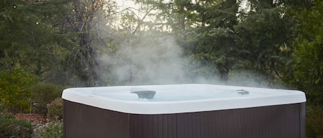 Indulge in pure relaxation as you set your sights on our inviting hot tub!