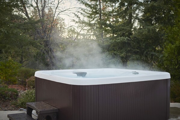 Indulge in pure relaxation as you set your sights on our inviting hot tub!