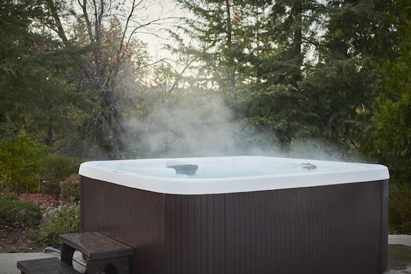 Indulge in pure relaxation as you set your sights on our inviting hot tub!