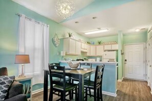 Dining area and breakfast bar. 
