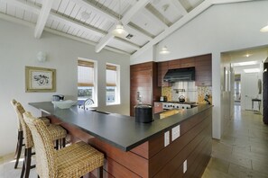 MODERN KITCHEN W/BAR TOP SEATING FOR THREE