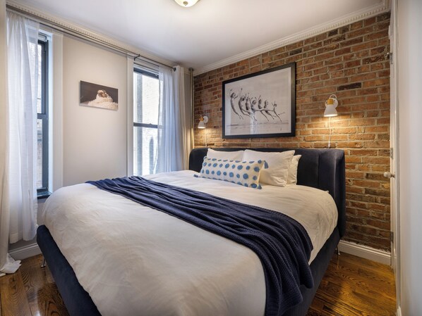 Master Bedroom - King Sized Bed. Sheets, linens, and down-filled comforters.