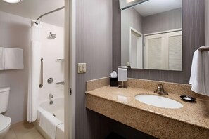 Full bathroom with a shower/tub. Basic toiletries and towels are provided