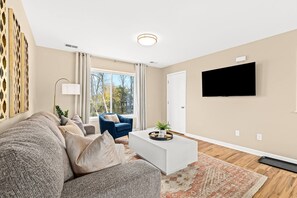 Unwind in our welcoming lounge area, featuring comfortable seating and a smart TV to enhance your entertainment experience.