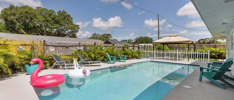 As the day unfolds, the pool area transforms into a serene haven, perfect for evening relaxation.