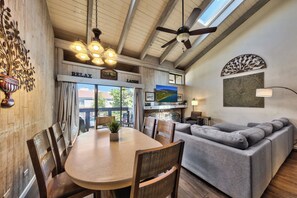 Gather around the fireplace for a cozy movie night in the living room