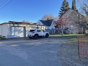 Driveway. One car allowed on the right side (away from garage).