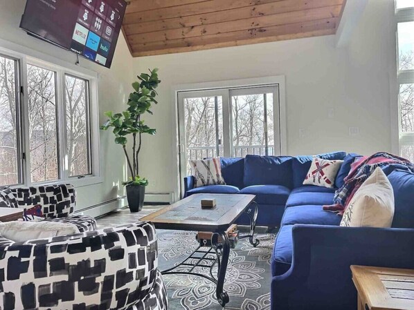 Living area flooded with natural light.