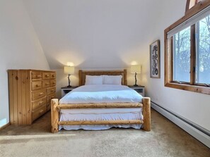 Experience royalty and serenity in our queen-size bedroom.