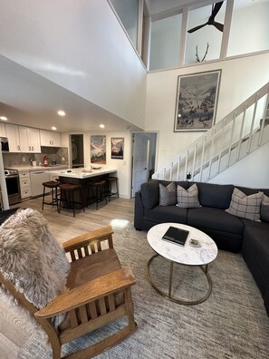 High ceilings, light and bright living area