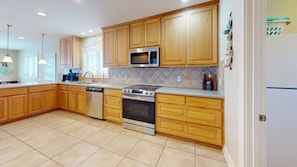 Large kitchen with electric range