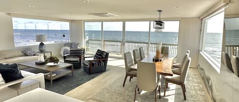 Front room and dining room with a 270 degree view of the beautiful ocean