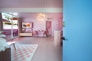 Entering Pink Paradise you are welcomed into an open floorplan and pink details!