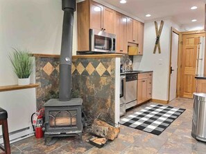 Our living room with a fireplace is the heart of the home. Wood provided.
