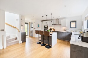 Equinox, Silverlake: The modern kitchen area, with a breakfast bar