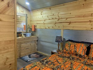 Buffalo Wallow Cabin - hunting cabin with camo and wood toned decor