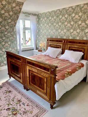 Beautiful antique king size bed with quality embroidered bedding