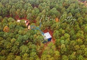 Hidden among the trees, your private oasis awaits. Nature Cottage is your slice of heaven from above