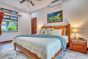 King-size bed in the primary suite.  Views of the volcano when you awaken.