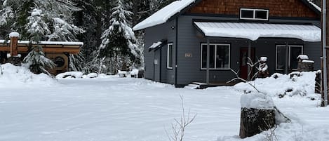 Covered area sits behind the house for added privacy