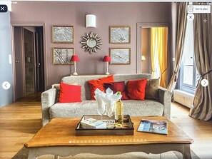 The living roomvery bright and calm with three windows