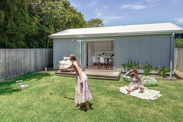 Set up a picnic in the backyard and enjoy the lawn games