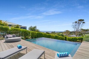The stunning infinity pool, overlooking the bay