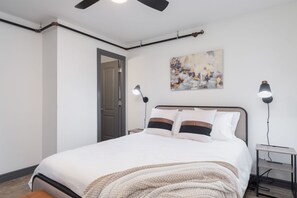 Delve into a realm where refinement meets usefulness with the bedside lamp, enhanced by captivating wall embellishments that amplify the aesthetic grandeur of our sumptuous bedroom sanctuary.