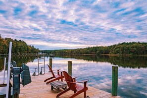 Ah, Adirondacks on the dock. Watch the skies turn purple and orange, and the dark skies at night. It's just what you needed.