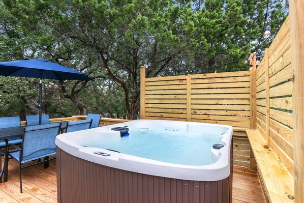 Indulge in the blissful seclusion of the private hot tub