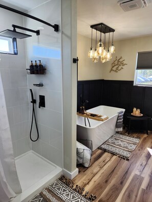 Master bath walk-in shower, and deep soaking bathtub.