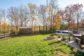 The back yard offers ample space for relaxation and play