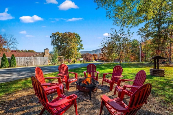 Enjoy those gorgeous mountain views while relaxing around the firepit.