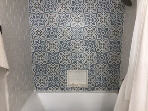 Guest bathroom soaking tub.