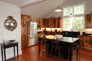 Stunning kitchen featuring upcycled wood