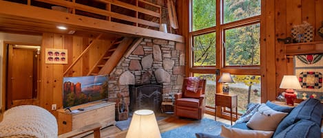 Living room views with a cozy wood burning fireplace