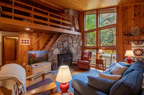 Living room views with a cozy wood burning fireplace